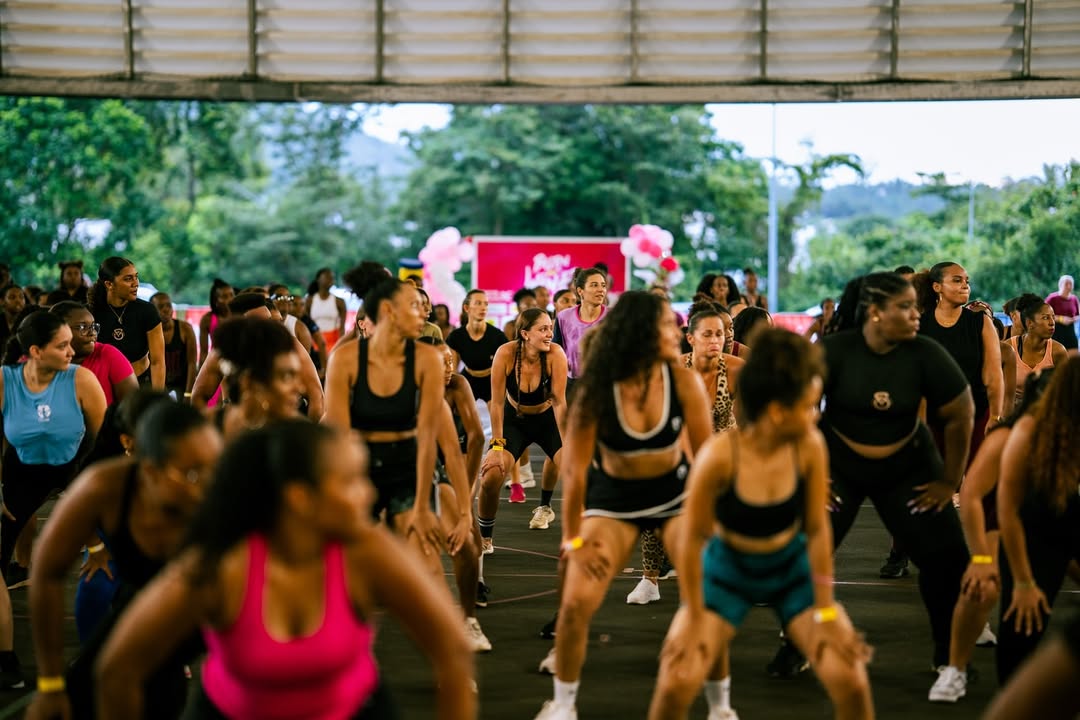 Dancers learning waist movement in a Winin' School class